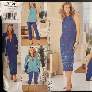 May include: A sewing pattern for four different clothing items. The pattern is for a halter top, a skirt, a top with a V-neck, and a pair of pants. The pattern is from Vogue Wardrobe and is number 2425.