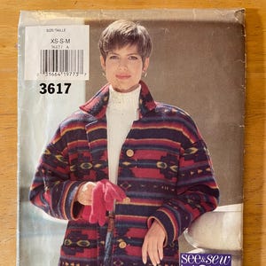 May include: A sewing pattern for a jacket with a southwestern-inspired design. The pattern is for sizes XS-S-M and is from the see&sew NOW line. The pattern is labeled "YES! IT'S easy".