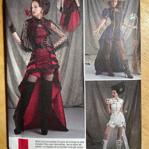May include: Simplicity pattern 8719 features three costume designs. One is a red and black gothic dress with lace accents. Another is a purple and black witch costume. The third is a white Frankenstein-inspired costume. Size U.S. 6-14.