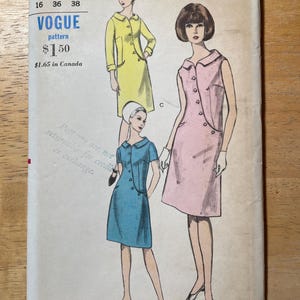 May include: Vintage Vogue pattern envelope featuring illustrations of three different dresses. The envelope is off-white with text and illustrations in black, yellow, blue, and pink. The pattern number is 6456, with bust and hip sizes listed.