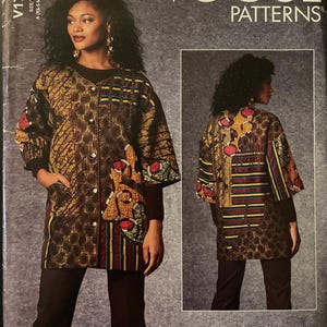 May include: Vogue Patterns sewing pattern featuring a woman wearing a patterned jacket and pants. The jacket has a button-up front, pockets, and colorful patchwork details. The pattern includes the text "V1712" and "Júlio César NYC".