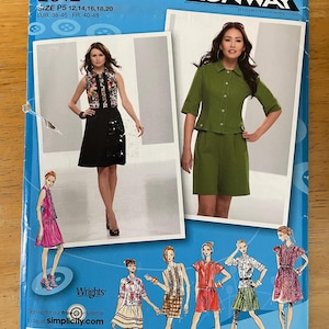 May include: Simplicity sewing pattern number 2612, inspired by Project Runway. The pattern includes instructions for making a skirt and top, with a size range of 12 to 20. The pattern is shown on a model wearing a black skirt and a white and black patterned top.