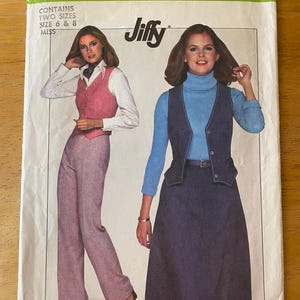 May include: Simplicity sewing pattern number 8156, Jiffy, contains two sizes, size 6 & 8, miss. The pattern shows two women wearing vests, one with a plaid skirt and the other with a blue skirt.