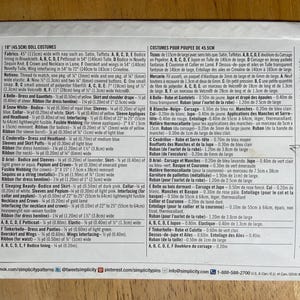 May include: A white paper sewing pattern envelope for 18-inch doll costumes, labeled 1581 with 32 pieces. The back displays detailed fabric requirements, notions, and illustrations for six different character outfits in English and French text.