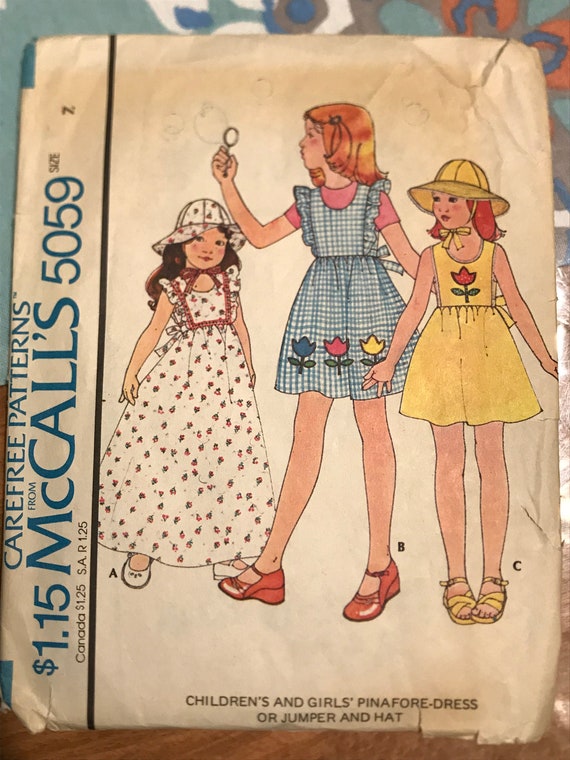 cut out jumper dress Mccalls 5059 Pattern CUT MISSING TULIP 1970s Vintage Girl's Easy Carefree  Ruffled Jumper Dress in Mini or Maxi Length and Brimmed Hat Size 7