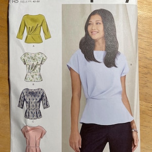 May include: Simplicity sewing pattern S9470 showing illustrations of four different tops. The pattern includes sizes U.S. 14-22 and is designed and printed in the USA. The pattern also includes European sizes 40-48 and French sizes 42-50.