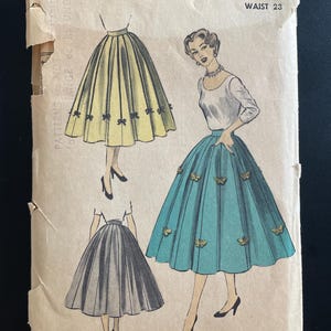 May include: Vintage sewing pattern for a skirt, featuring illustrations of the design in yellow, teal, and gray. The pattern includes the text "ADVANCE * 6348" and "WAIST 23". The price is listed as 35c and 40c in Canada.