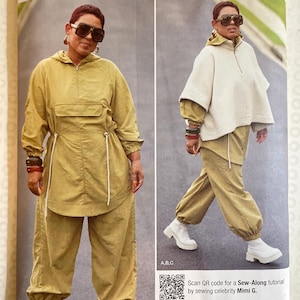 May include: Simplicity sewing pattern S9687 featuring a two-piece outfit. The pattern includes sizes 8-16. The image shows a model wearing a hooded jacket and pants in a light olive green color. The pattern is designed and printed in the USA.