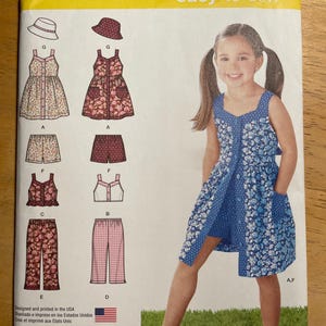 Simplicity 1453 Pattern UNCUT Easy to Sew Girl&#39;s Summer Sleeveless Button Front Sundress or Tank Top Sorts Bottoms Sun Hat Size 3 4 5 6 7 8
