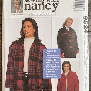 May include: A sewing pattern envelope with the text "sewing with nancy" and "Patterns by Nancy Zieman for McCall's". The envelope features images of jackets and the text "Simple-to-Sew", "Casual-to-Wear Styles", and "Fun-to-Sew Accents".