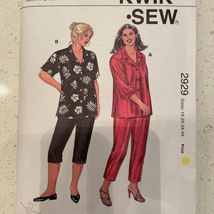 May include: Sewing pattern for a two-piece outfit. The pattern is for sizes 1X-2X-3X-4X. The pattern is called "Kwik Sew" and the pattern number is 2929.