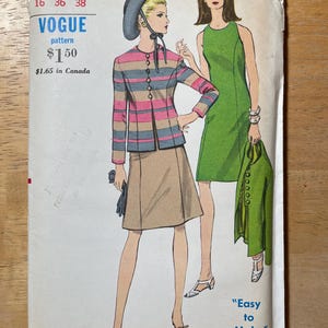 May include: Vintage Vogue sewing pattern 7019 with illustrations of two women in 1960s outfits. One model is in a striped jacket and skirt, the other in a green dress. The pattern includes size and price details.