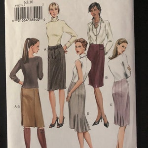 May include: Vogue basic design sewing pattern for a skirt. The pattern includes four different skirt styles: A-line, pencil, pleated, and a skirt with a ruffle at the hem. The pattern is available in sizes 6, 8, and 10.