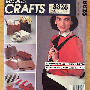 May include: A sewing pattern for making various bags, including a clutch, shoulder bag, briefcase, and tote bag. The pattern is from McCall's Crafts and is numbered 8828. The pattern is $4.00.