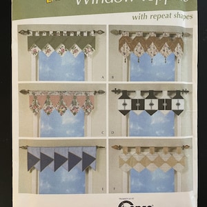 May include: Simplicity pattern 4973 for window toppers with repeat shapes. The pattern includes six different designs for window toppers, each with a different color scheme and pattern. The designs include a floral pattern, a geometric pattern, and a striped pattern. The pattern is labeled "EASY!" and is trimmed by Conso.