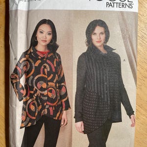 May include: Vogue Patterns sewing pattern V1817 featuring two jacket designs. The pattern includes sizes 8-16. One jacket has a black base with orange and red circular patterns. The other jacket is gray with a textured design.