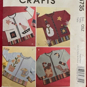 Peut inclure: Un patron de couture pour quatre différents pulls cardigan. Les pulls sont décorés d'applications représentant un bonhomme de neige, un voilier, un chat et un pot de fleurs. Le patron est de McCall's Crafts et est de taille OSZ. Le numéro du patron est M4735.