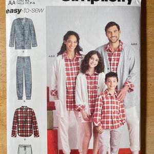 May include: Simplicity sewing pattern S9691, showing a family in matching pyjamas. The pattern includes options for a cardigan, trousers, shorts, and a button-down shirt. The text "easy-to-sew" is displayed on the pattern.