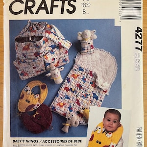 McCalls 4277 Pattern UNCUT 1980s Baby's Things Bottle Holder Rattles Bibs Stuffed Toy Bunting Changing Pad Diaper Bag
