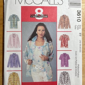 May include: McCall's sewing pattern envelope featuring a woman modeling a floral print jacket and other shirt styles. The envelope includes the text "GREAT LOOKS 1 EASY PATTERN" and size information.