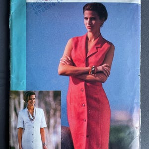 May include: A vintage sewing pattern for a sleeveless red dress with buttons, from the Glamour Collection by Butterick. The pattern features a woman wearing the dress, with a smaller image of a white dress with short sleeves.