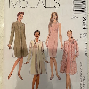 May include: A sewing pattern for a dress with three different styles. The pattern is for sizes 8-10-12. The pattern is called McCall's 2584.