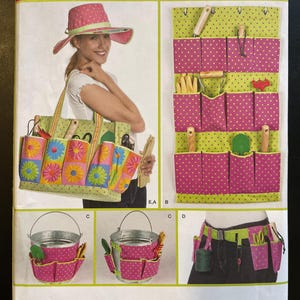 May include: A sewing pattern for a gardening tote bag, a hanging organizer, and a bucket with pockets. The pattern is from Simplicity and is designed by Donna Lang Accessories. The pattern is for one size.