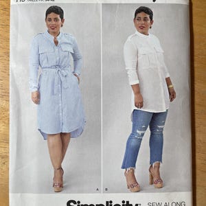 May include: Simplicity sewing pattern S8830 featuring Mimi G Style. The pattern includes two shirt dress designs. The cover shows a woman wearing a blue and white striped dress and a white shirt with jeans. The pattern size is U.S. 6-14.