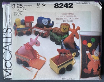 Patrón McCalls 8242 sin cortar, para colgar en la pared, de los años 80, con diseño de tren de circo, payaso, unicornio, jirafa, león y elefante, Donna Lee Craft