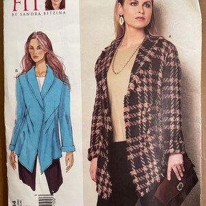 May include: A sewing pattern for a jacket with a long, open front and a collar. The pattern is from "Today's Fit by Sandra Betzina" and is for size OSZ. The pattern is shown on a model wearing a black and white checked jacket.