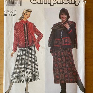 May include: Simplicity sewing pattern number 7013, size A (PT-XL), for a two-piece outfit. The pattern shows a red quilted jacket with a black and white patterned skirt and a black and white patterned top with a black and red patterned skirt.