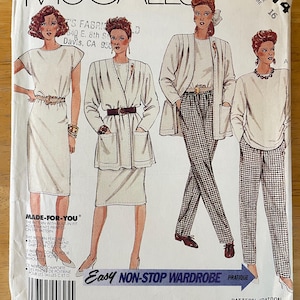 May include: A sewing pattern for women's clothing. The pattern includes instructions for a white dress, a white cardigan, and plaid pants. The pattern number is 3414 and the size is 16. The pattern is called "Easy Non-Stop Wardrobe".
