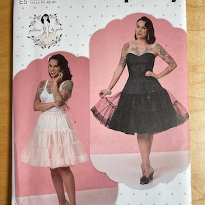 May include: Simplicity sewing pattern S9293 featuring two dress designs. The cover shows illustrations of the finished dresses, one in black and one in pink, with the text "patterns by Gertie". The pattern size is U.S. 14-22.
