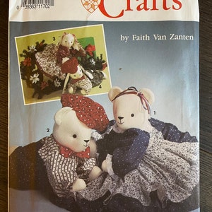 May include: Simplicity Crafts pattern number 7474 for making a set of three stuffed animals. The pattern includes instructions for making a bunny wearing a red and white dress, a bunny wearing a blue and white dress, and a bear wearing a blue and white dress. The pattern is by Faith Van Zanten.
