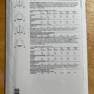 May include: A Vogue Patterns sewing pattern for a unisex bomber jacket, featuring size and fabric requirements. Includes measurements in inches and yards, with diagrams and text in English.