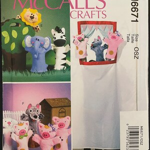 May include: A sewing pattern for making finger puppets. The pattern includes instructions for making a zebra, elephant, lion, wolf, and pig finger puppets. The pattern is for size OSZ. The pattern is from McCall's Crafts.