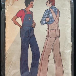 May include: Vintage Butterick sewing pattern featuring illustrations of two people wearing overalls. The pattern includes the text "Buucnck THE FASHION ONE" and the number "3571". The price is listed as $1.00. The size range is 34-40.