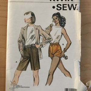 May include: A sewing pattern for two outfits, one with a blazer and shorts, and the other with a sleeveless top and shorts. The pattern is from Kwik-Sew Pattern Co., Inc. and is for sizes 14-16-18-20.