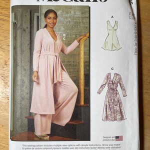 May include: McCall's sewing pattern M8245 featuring a woman wearing a pink outfit. The pattern includes multiple view options with simple instructions. Designed and printed in the USA.