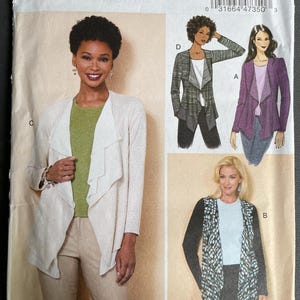 May include: A Butterick sewing pattern, B6527, featuring images of women's jackets. The pattern includes a variety of jacket styles, including a draped cardigan and other designs. The cover displays the Butterick logo and pattern number.