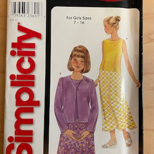 May include: Simplicity sewing pattern number 9001, size A 7-16, for girls. The pattern includes instructions for making a sleeveless dress with a yellow and white plaid skirt and a purple cardigan with a floral print skirt.