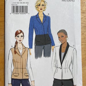 May include: Vogue Patterns sewing pattern V8931. The cover features illustrations of three different jacket designs. The pattern includes sizes E5 (14-16-18-20-22). The Vogue Patterns logo and the year 2013 are also visible.