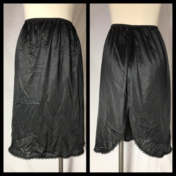 Vintage Warner's Black Nylon Half Slip With Lace Trim and Back Slit Length  25 Size Medium Below Knee Length 