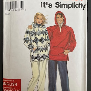 May include: A Simplicity sewing pattern envelope 8314 for hooded pullovers in sizes XS, S, M, L, and XL. The cover features illustrations of two hooded pullovers, one with a blue and grey geometric star pattern and one in solid red, both with front pockets.