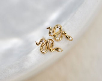 small snake stud earrings gold