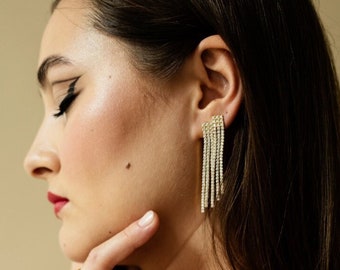 long elegant earrings gold