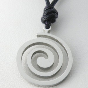 Celtic Swirl Pendant Set on a black cord Slider Knot necklace