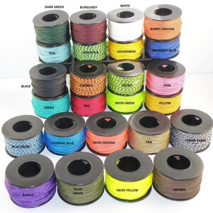 May include: A collection of spools of paracord in various colors, including black, white, dark green, burgundy, burnt orange, teal, aquatica, goldenrod, midnight blue, fireball, gecko, pink, neon green, yellow, red, green, colonial blue, neon orange, tan, urban camo, blue snake, olive green, neon yellow, brown, and purple.