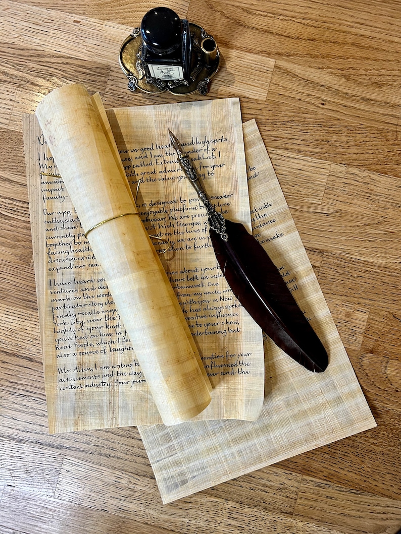 May include: A handwritten letter on parchment paper with a quill pen and inkwell. The letter is written in a cursive script and includes the text "De Tha Myn impact family- Our app, enthusiad and share t currently pal together to m facing health discussions wh expand our rea I have heard co Ventures and acs mark on the work particular story do Fondly recalls enge York City, near the ' highly of your kind you've had on him. In t Real People, which I for aloo a source of laught Mr. Allen, I am writing be achievements and the way. content industry. Your jours in good heath and high spints wwes and lam the under of a op called Extrend calchists! for your Dith great adnure and the value is designed be pro sneaker enjoyable platform bplore ears We are proud be wut Wish Georgus at on the Lives lives of meation to furth mes about yourl have left an inde tainment. One from my uncle, wh swith you in New He has always spoke positive influence to your show, intertaiming but ration for youn influenced the mr and the bo and twith the dance make be Lee Pill"