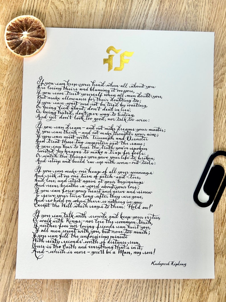 May include: A white paper sheet featuring the poem If by Rudyard Kipling written in black calligraphy. A gold logo is at the top center. A black paper clip is attached to the right side, and a dried orange slice sits in the top left corner.
